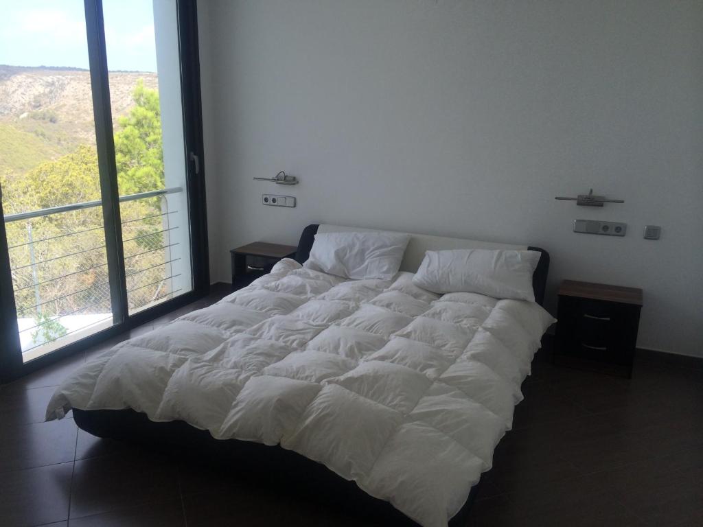 DP-02-ENJ-VI-00349-C-15 Schitterende villa met zeezicht te koop in Javea