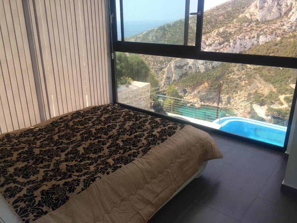 DP-02-ENJ-VI-00349-C-16 Schitterende villa met zeezicht te koop in Javea