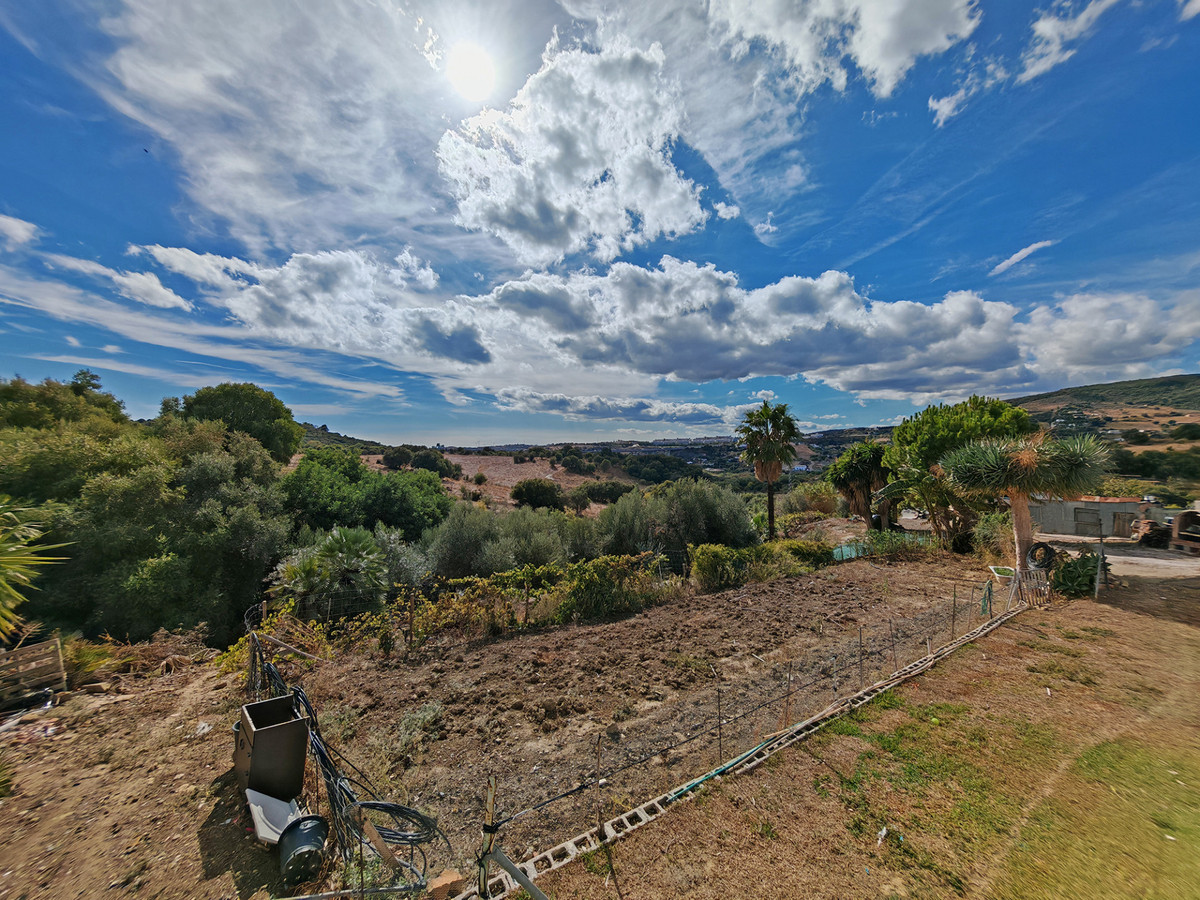 Finca met zeezicht te koop in Estepona