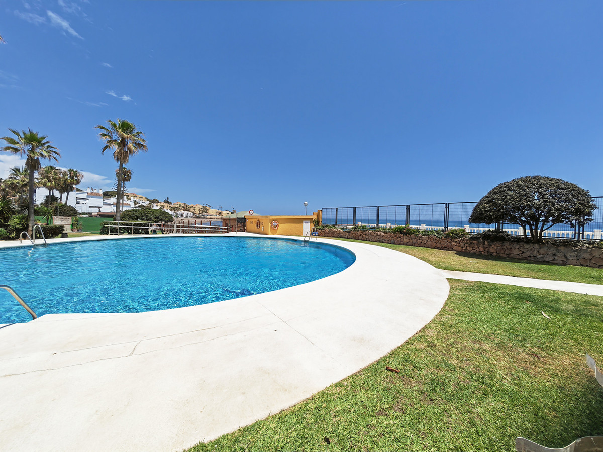 Gelijkvloers appartement aan het strand in Mijas Costa