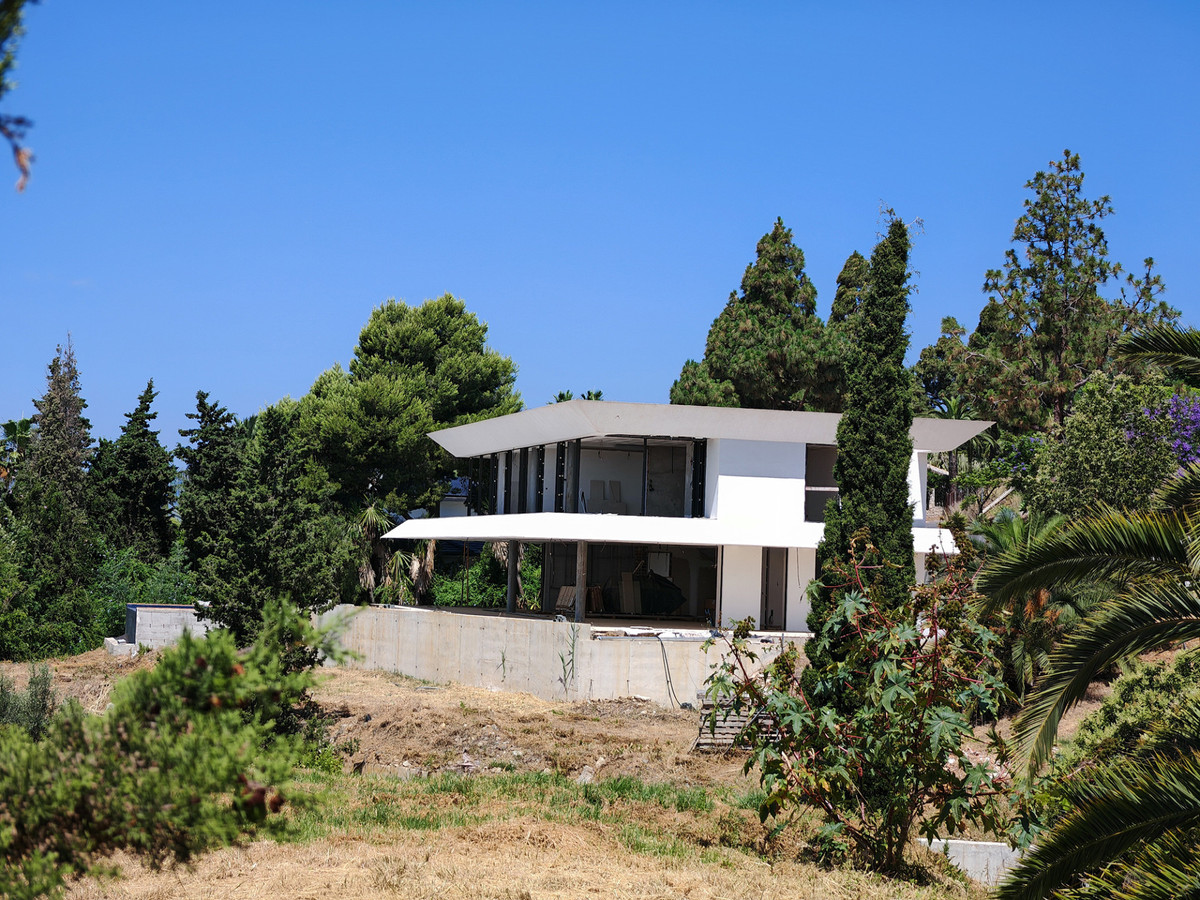 DP-12-R5411797-4 Moderne nieuwbouw villa met gastenverblijf en zeezicht in Marbella