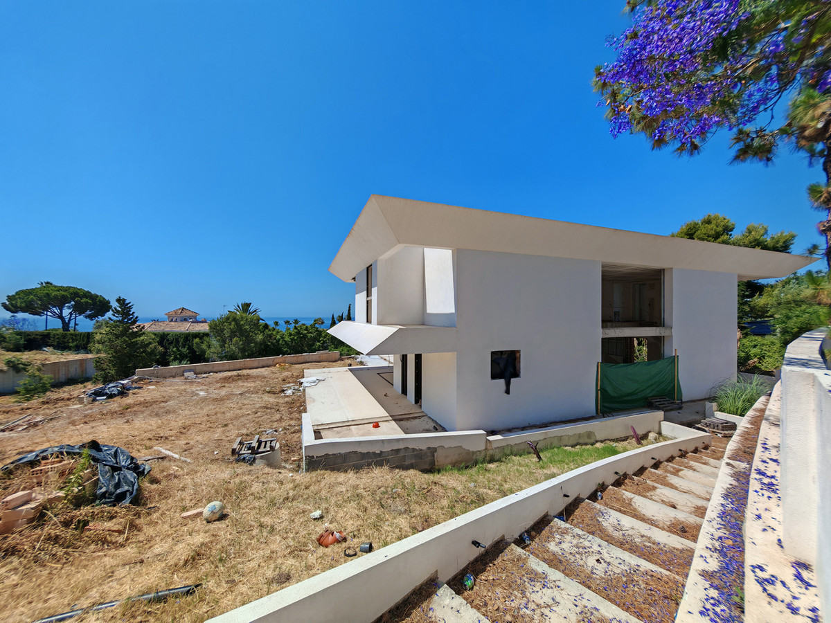 DP-12-R5411797-5 Moderne nieuwbouw villa met gastenverblijf en zeezicht in Marbella