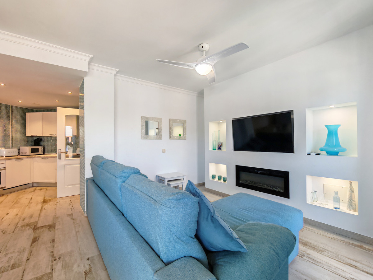 Gerenoveerd appartement met open uitzicht te koop in Manilva