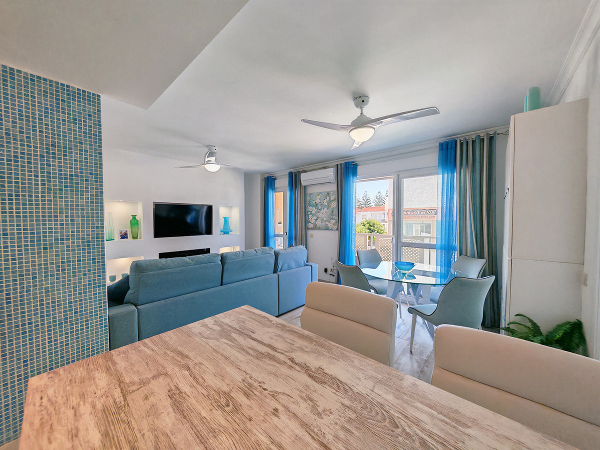 Gerenoveerd appartement met open uitzicht te koop in Manilva